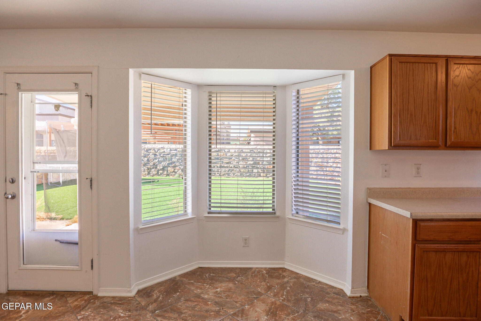 1497 Dunlin Place El Paso, TX 79928 - Photo 9 of 38 a view of a room that has a window in it