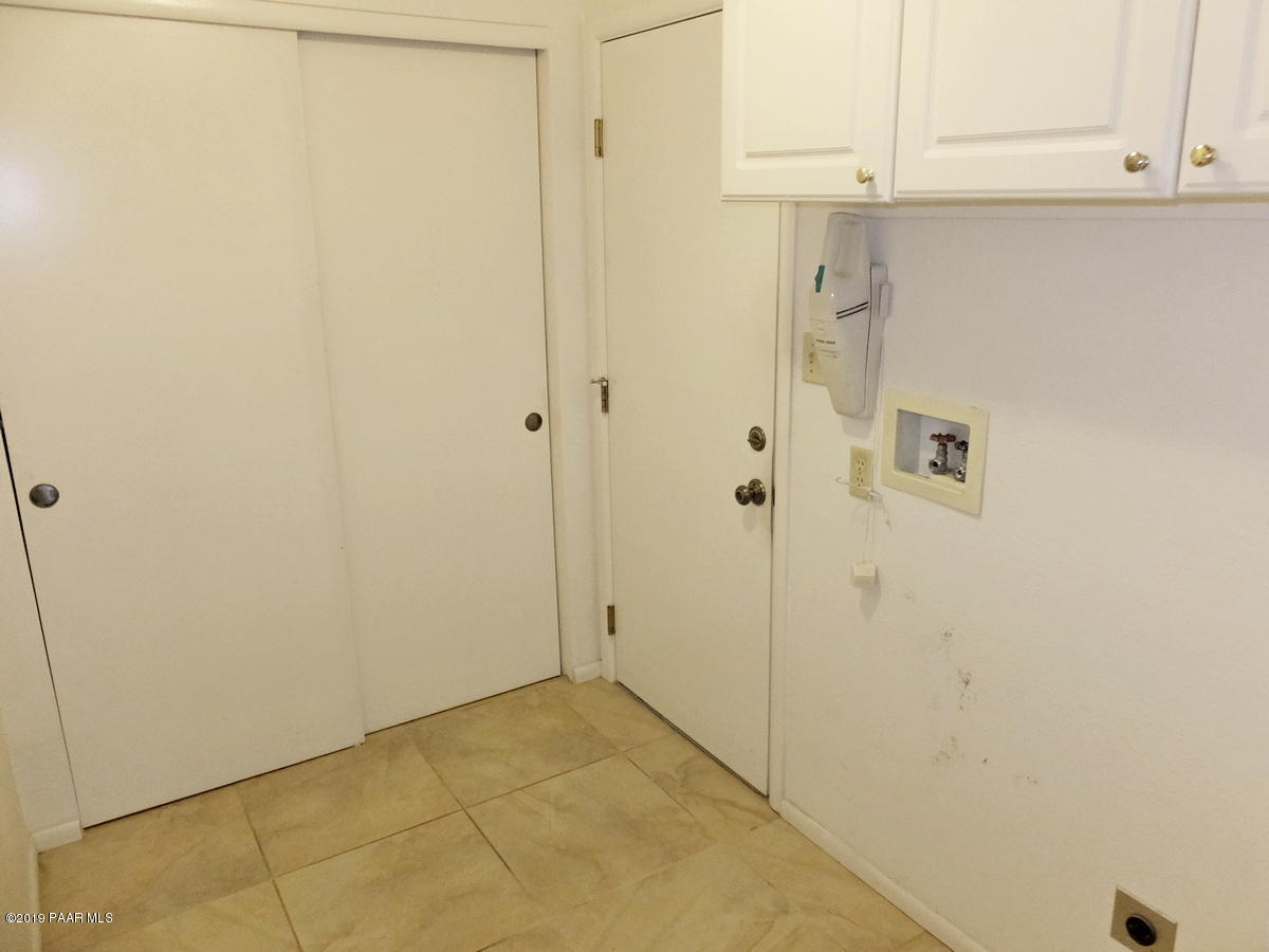 11950 Rawhide Ridge Dewey, AZ 86327 - Photo 29 of 37 a view of a utility room with closet