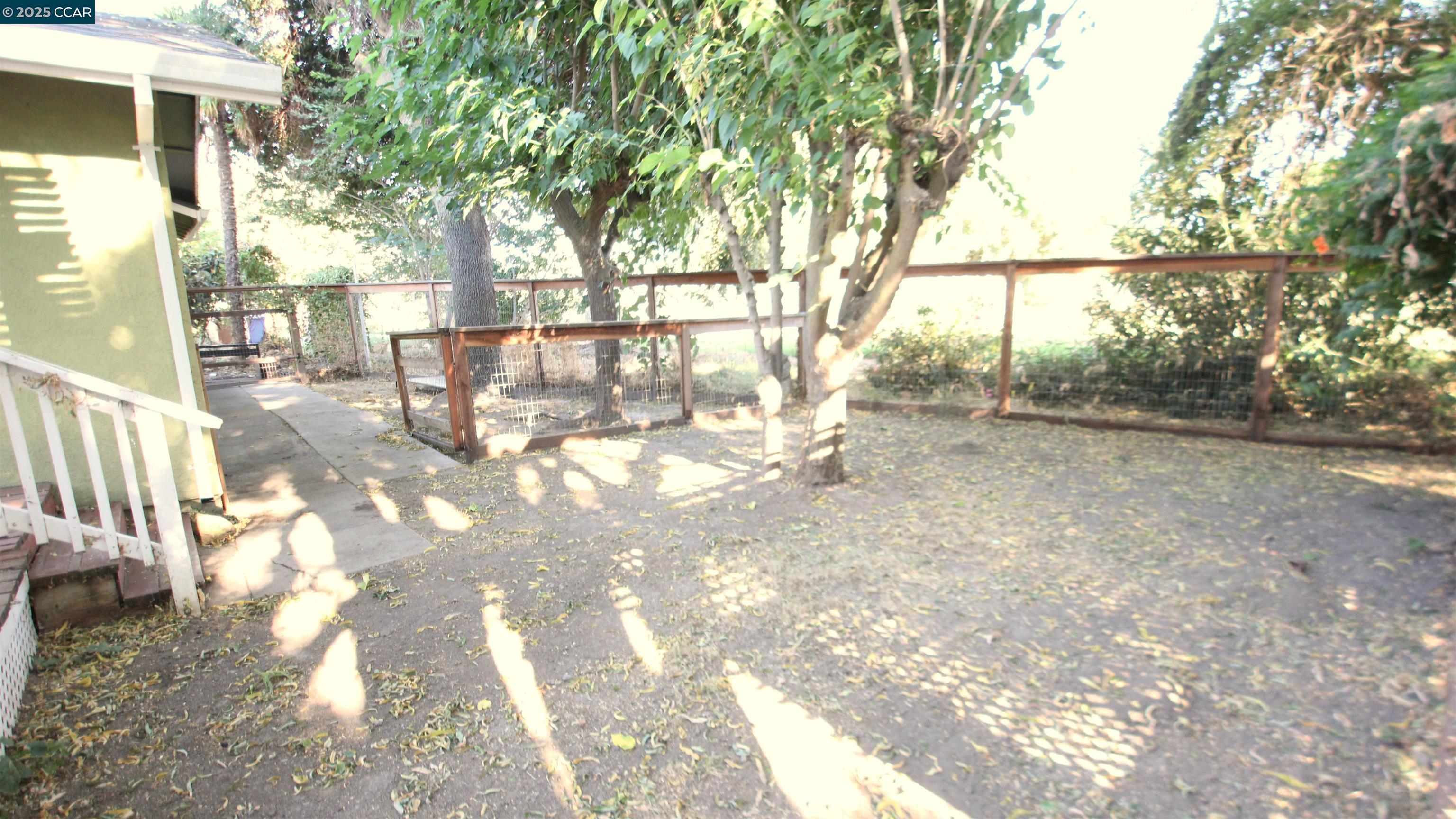 10 School Street Isleton, CA 95641 - Photo 15 of 23 a view of yard with large trees