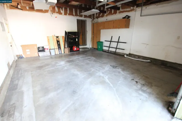 a view of a garage with storage