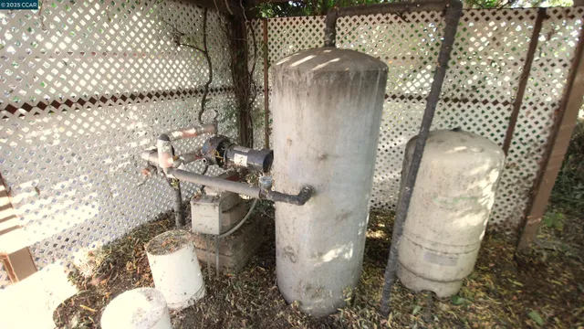 a bathroom with a toilet and shower