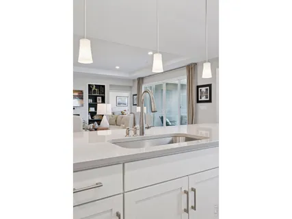 a bathroom with a sink double vanity and a mirror