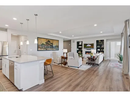 a view of a living room and dining room
