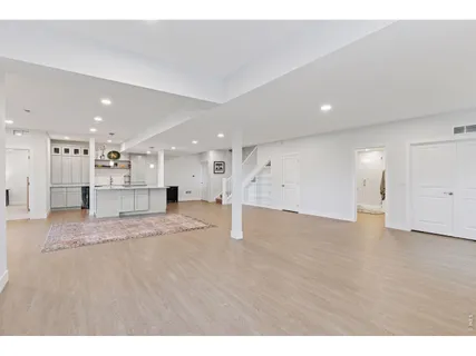 a view of kitchen and a refrigerator