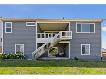 a view of house with front yard
