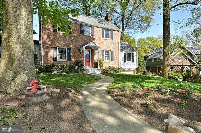 9503 St Andrews Way Silver Spring, MD 20901 - Photo 2 of 30 a front view of a house with a yard