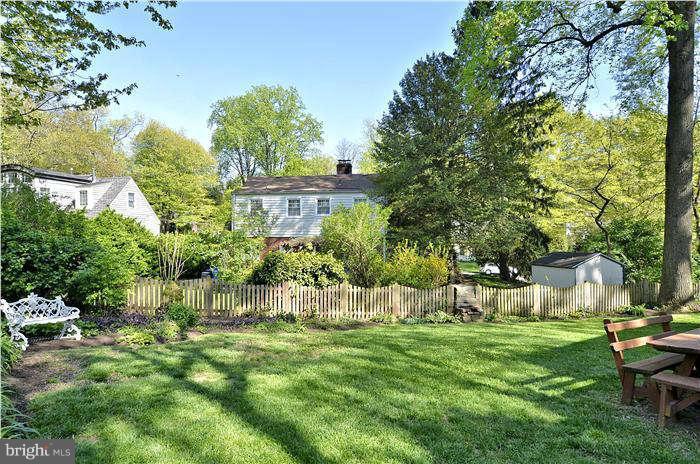 9503 St Andrews Way Silver Spring, MD 20901 - Photo 3 of 30 a view of an house with backyard and a tree