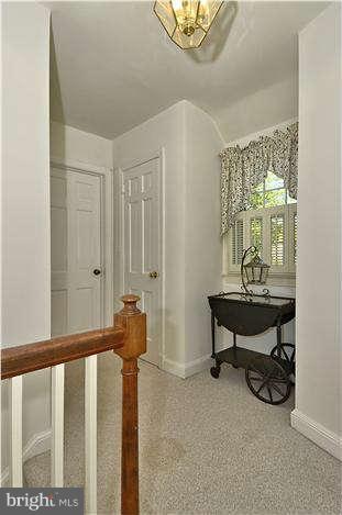 9503 St Andrews Way Silver Spring, MD 20901 - Photo 27 of 30 a view of a room with furniture and a window