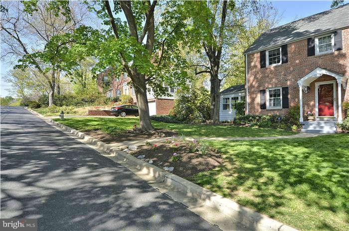 9503 St Andrews Way Silver Spring, MD 20901 - Photo 29 of 30 a front view of a house with garden