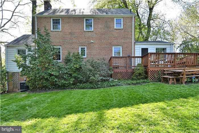 9503 St Andrews Way Silver Spring, MD 20901 - Photo 4 of 30 front view of a house with a yard