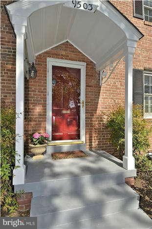9503 St Andrews Way Silver Spring, MD 20901 - Photo 5 of 30 a front view of a house with outdoor space and garage
