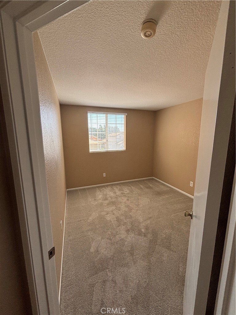 43545 Corte Logrono Temecula, CA 92592 - Photo 16 of 49 an empty room with windows