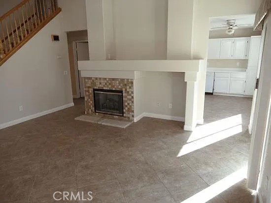 43545 Corte Logrono Temecula, CA 92592 - Photo 22 of 49 a view of a livingroom with an empty space and a fireplace