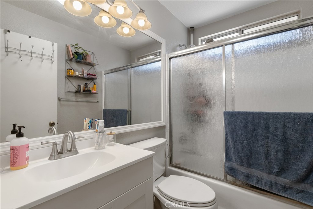43545 Corte Logrono Temecula, CA 92592 - Photo 25 of 49 a bathroom with a sink toilet and shower
