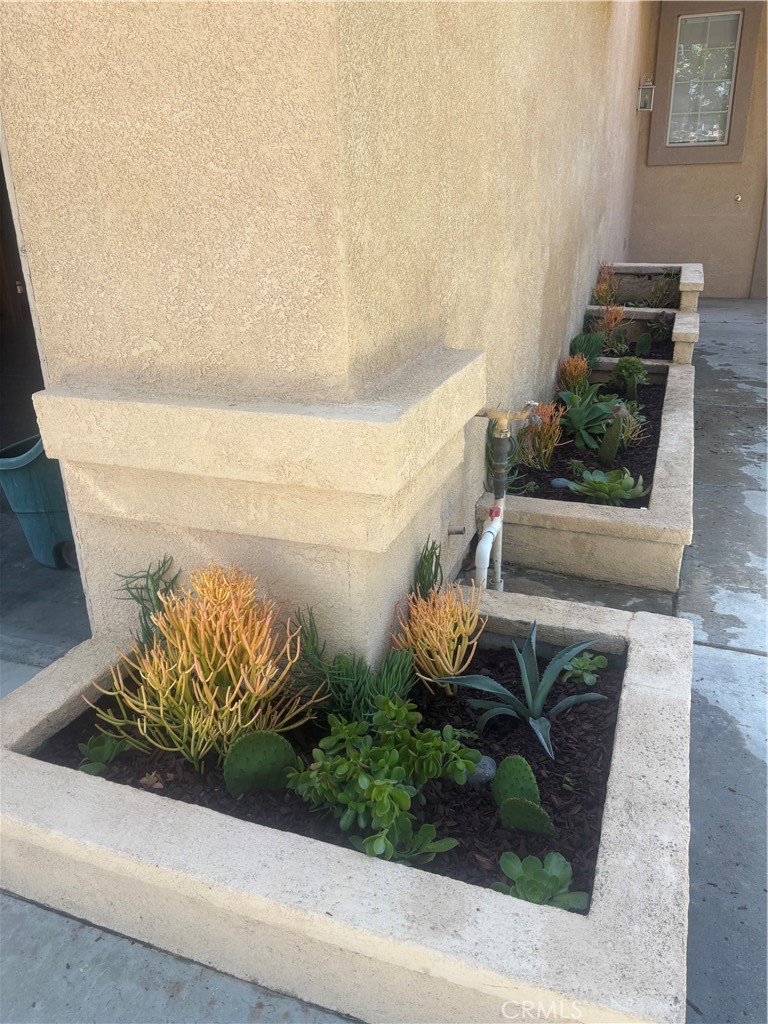 43545 Corte Logrono Temecula, CA 92592 - Photo 33 of 49 a front view of a house with a yard