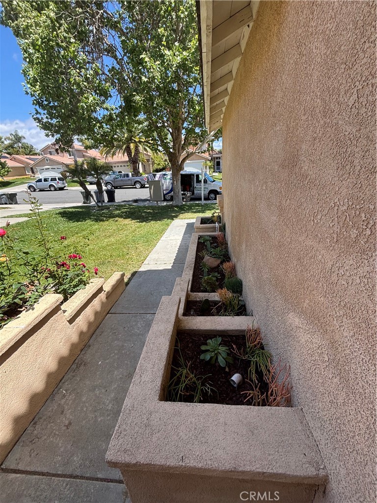 43545 Corte Logrono Temecula, CA 92592 - Photo 34 of 49 a view of a yard with potted plants