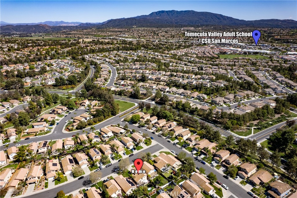 43545 Corte Logrono Temecula, CA 92592 - Photo 44 of 49 an aerial view of residential houses with city view