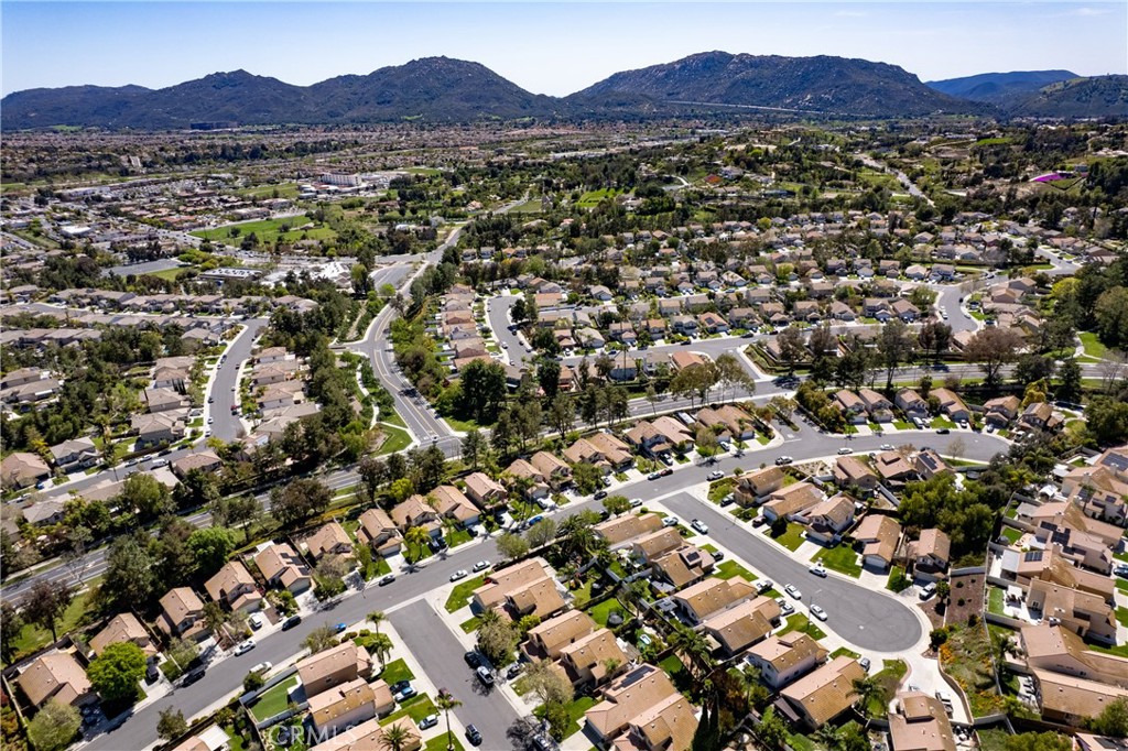 43545 Corte Logrono Temecula, CA 92592 - Photo 47 of 49 an aerial view of residential house and sandy dunes