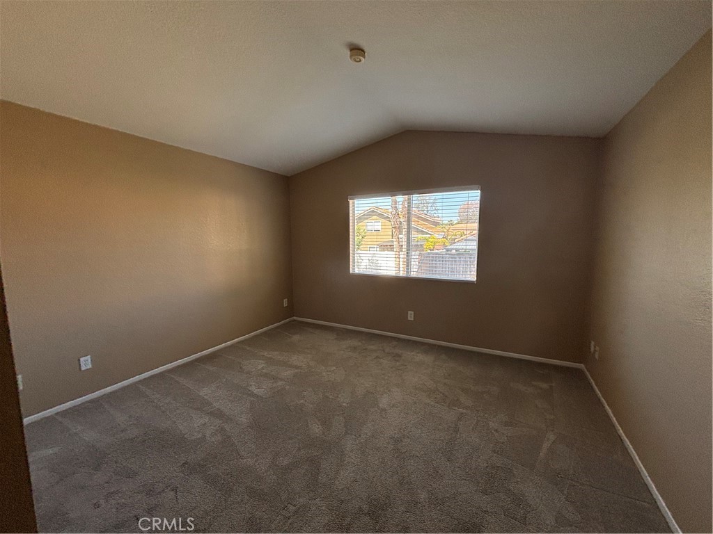43545 Corte Logrono Temecula, CA 92592 - Photo 10 of 49 an empty room with windows
