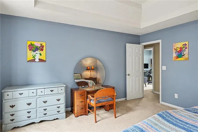 a bedroom with a bed and furniture