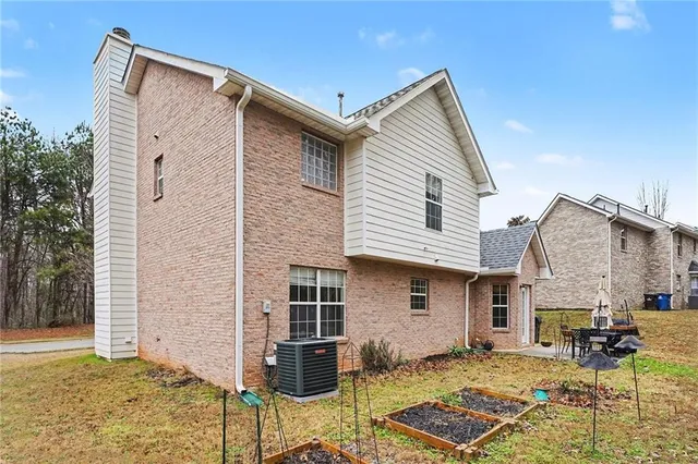a front view of a house with yard