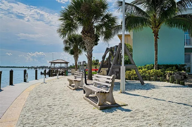 a view of a backyard with a patio