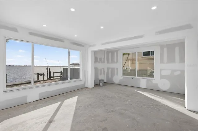 a view of a lake with a yard