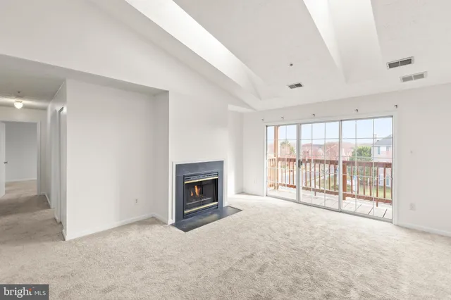 a view of livingroom with a fireplace