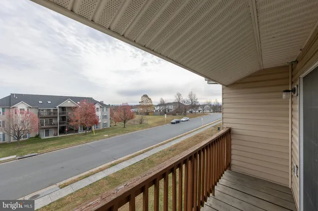 a view of a balcony with city view