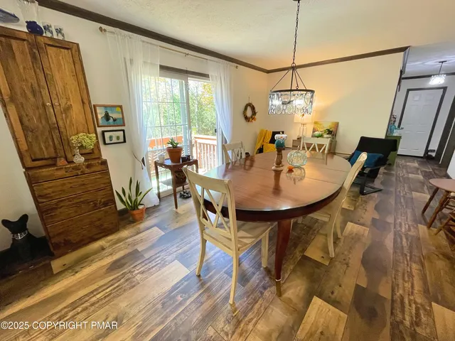 a living room with wooden floor