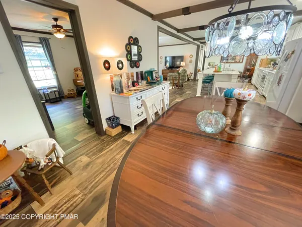 a bedroom with two beds and a window