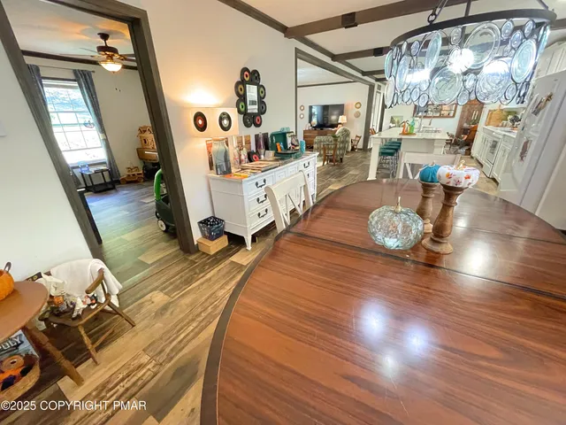 a bedroom with two beds and a window