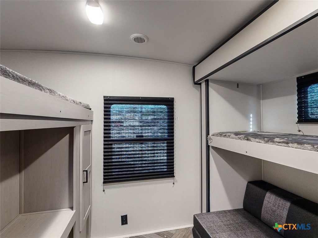 507 East Plasuela Street Refugio, TX 78377 - Photo 15 of 18 a view of a kitchen from the hallway