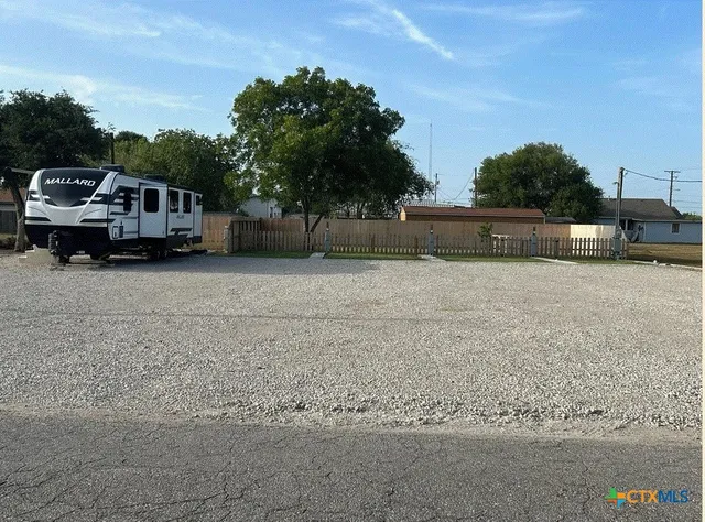 a house with trees in the background