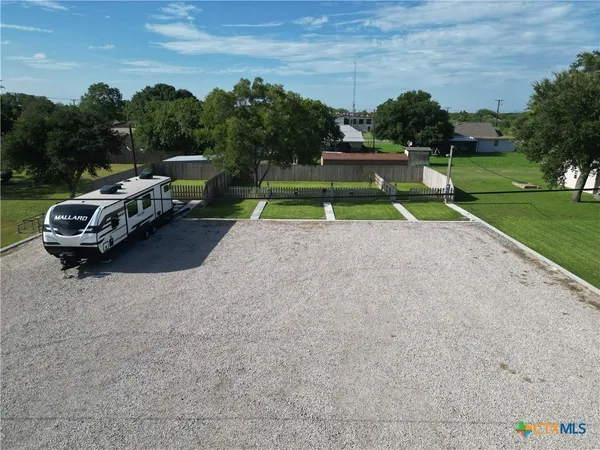 a view of a park with of swings