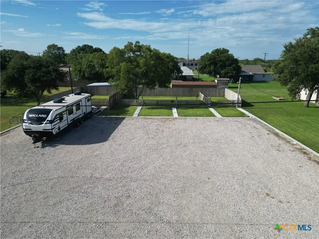 a view of a park with of swings
