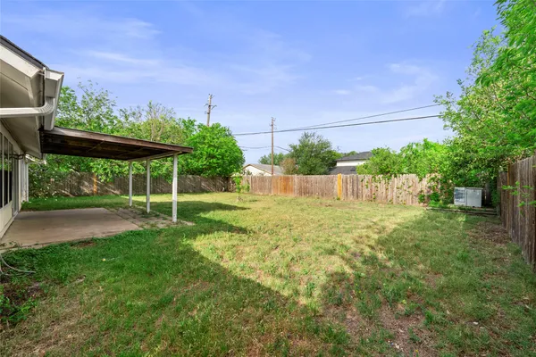 a view of a backyard with a garden