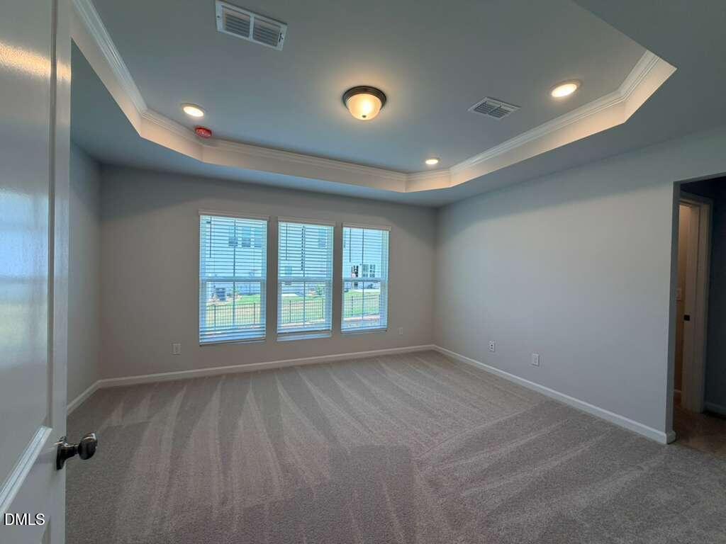 5024 Reader Way Durham, NC 27703 - Photo 16 of 26 a view of an empty room with a window