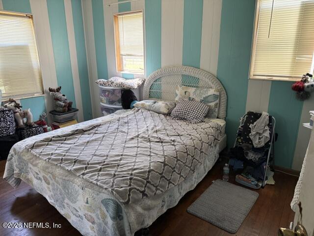 5214 Carter Spencer Road Middleburg, FL 32068 - Photo 17 of 50 a bedroom with a bed and windows