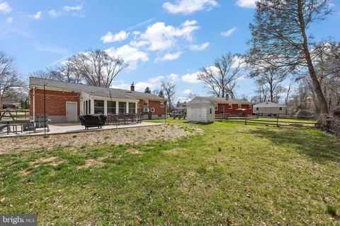 a view of a house with a big yard