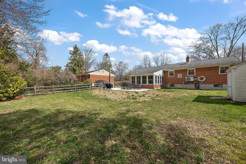 a view of a house with a big yard