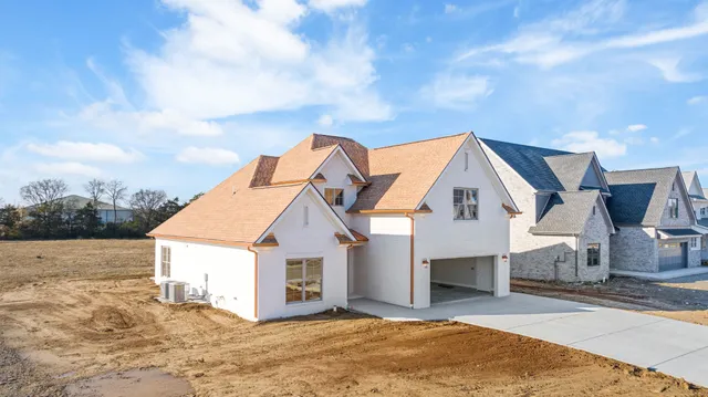 a kitchen with a sink and a refrigerator