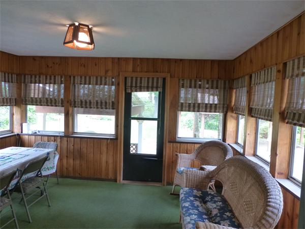 9 Sandberg Road Billerica, MA 01821 - Photo 18 of 23 a living room with furniture and a lamp