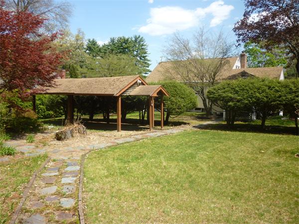 9 Sandberg Road Billerica, MA 01821 - Photo 8 of 23 a view of a house with backyard and sitting area