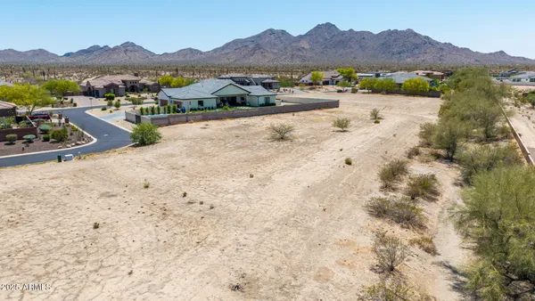 a view of a lake with a city
