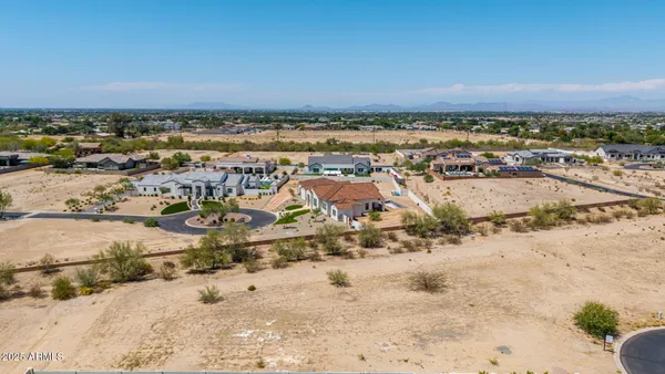 an aerial view of residential house and lake view