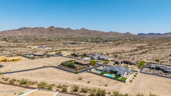 a view of a swimming pool with lounge chair