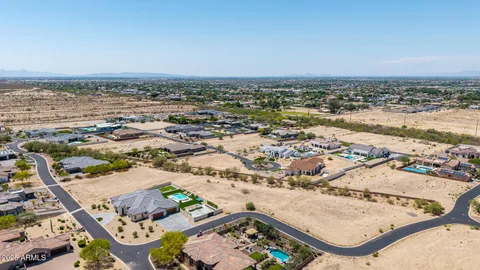 an aerial view of residential houses and outdoor space