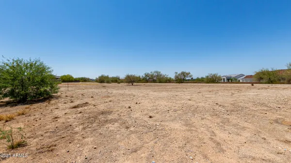 a view of a road with an ocean view