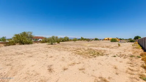 a house with trees in the background